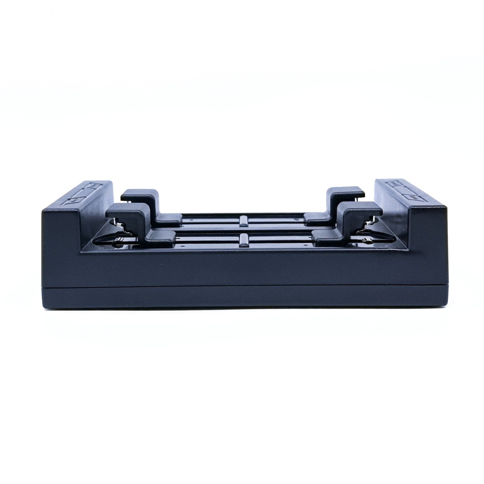 Button rechargeable battery 4 slot charger-Side view