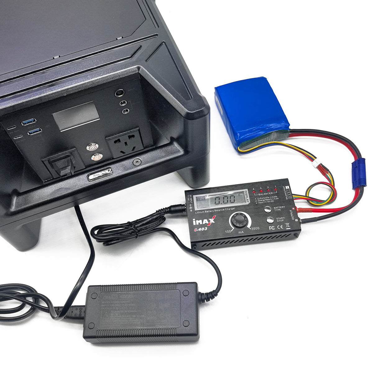 Adjustable lithium battery balance charger connected to 12V 5A power supply
